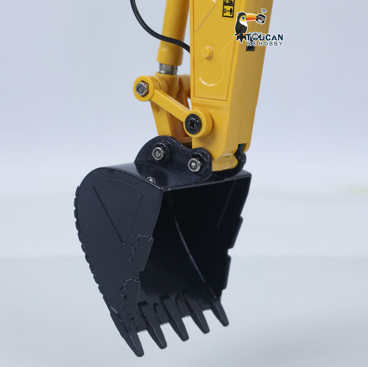 حفارة تحكم عن بعد صغيرة بمقياس - مراجعة Rc Hobby Toucan وسعره